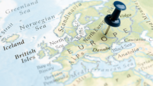Map with a push pin in Europe.