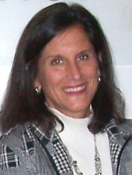 Susan Olivo smiling at the camera
